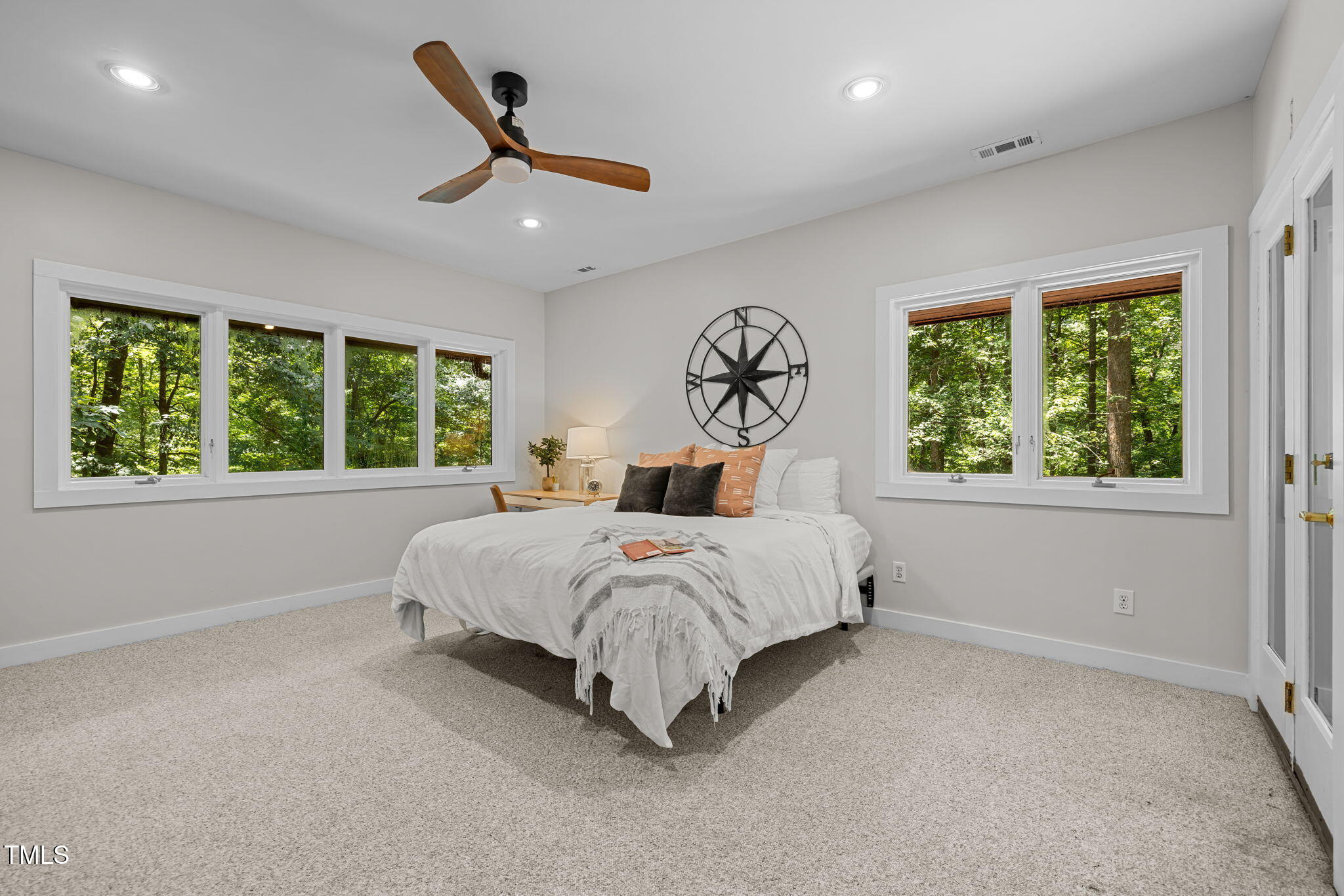 801 Creekstone Drive Chapel Hill, NC 27516 - Photo 16 of 65 a bed sitting in a room next to a window