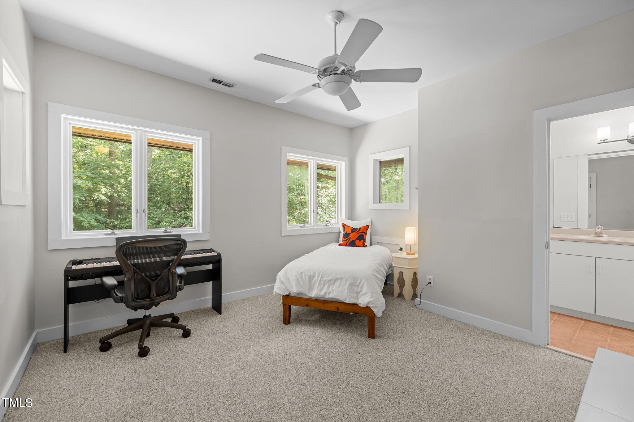 801 Creekstone Drive Chapel Hill, NC 27516 - Photo 23 of 65 a bed room with furniture and a window