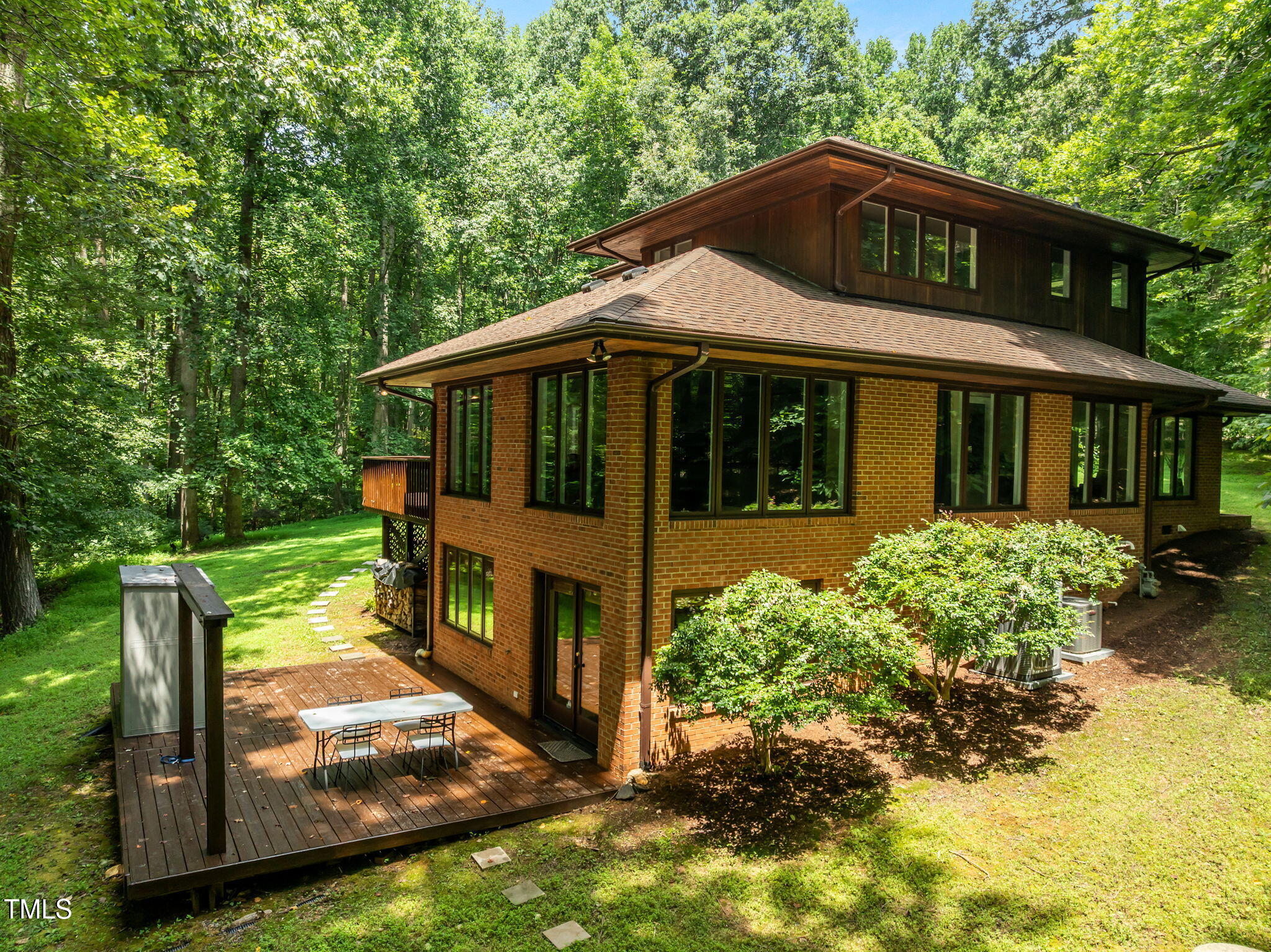 801 Creekstone Drive Chapel Hill, NC 27516 - Photo 34 of 65 a front view of a house with a yard