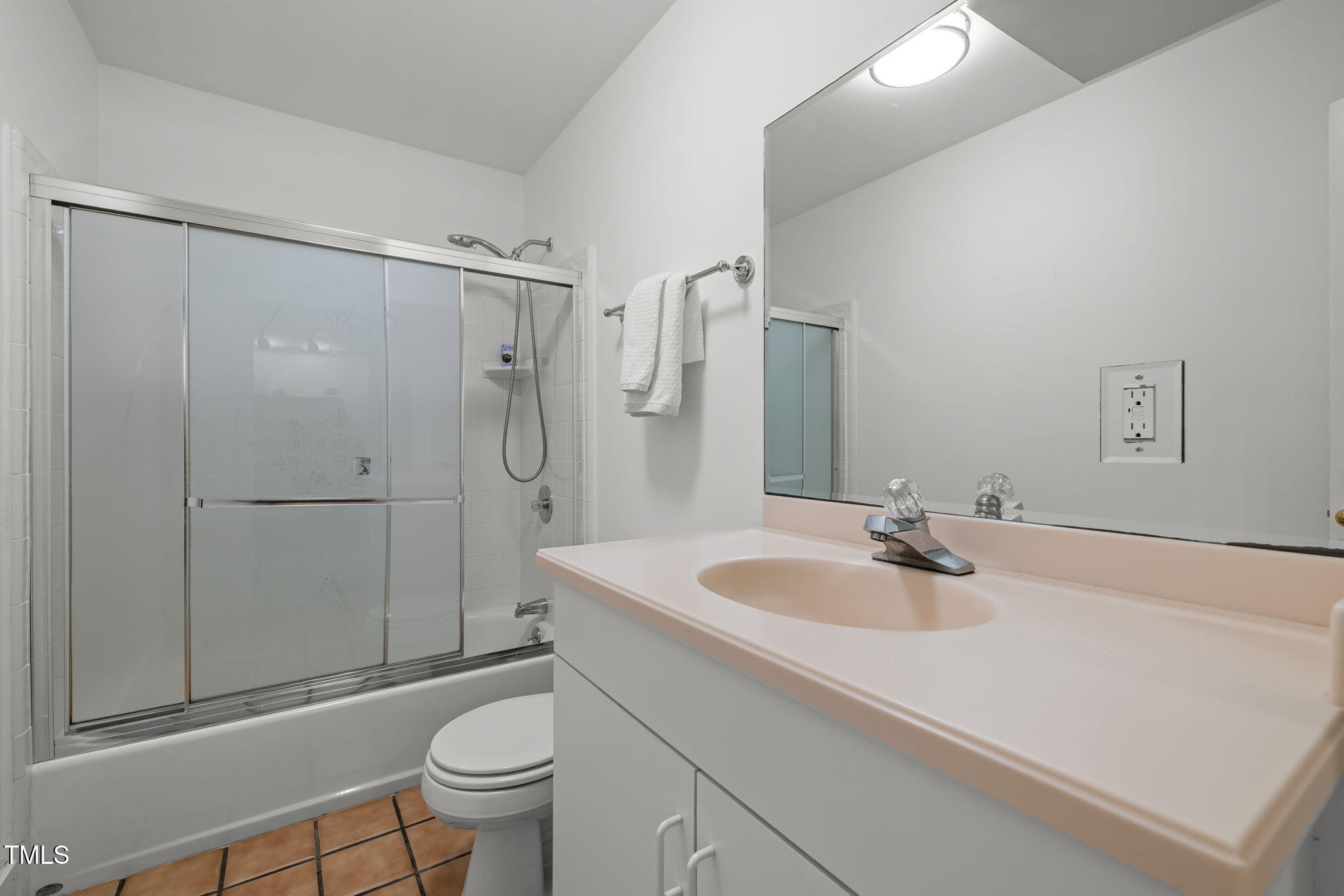 801 Creekstone Drive Chapel Hill, NC 27516 - Photo 45 of 65 a bathroom with a sink a toilet and shower