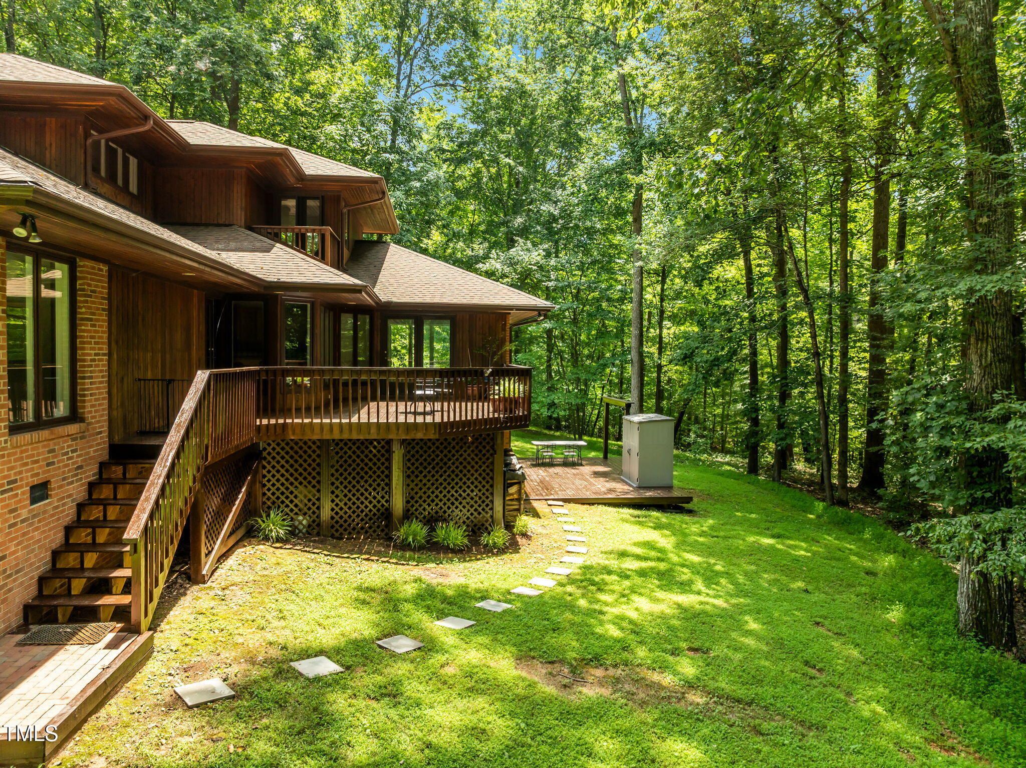 801 Creekstone Drive Chapel Hill, NC 27516 - Photo 47 of 65 a front view of a house with a yard