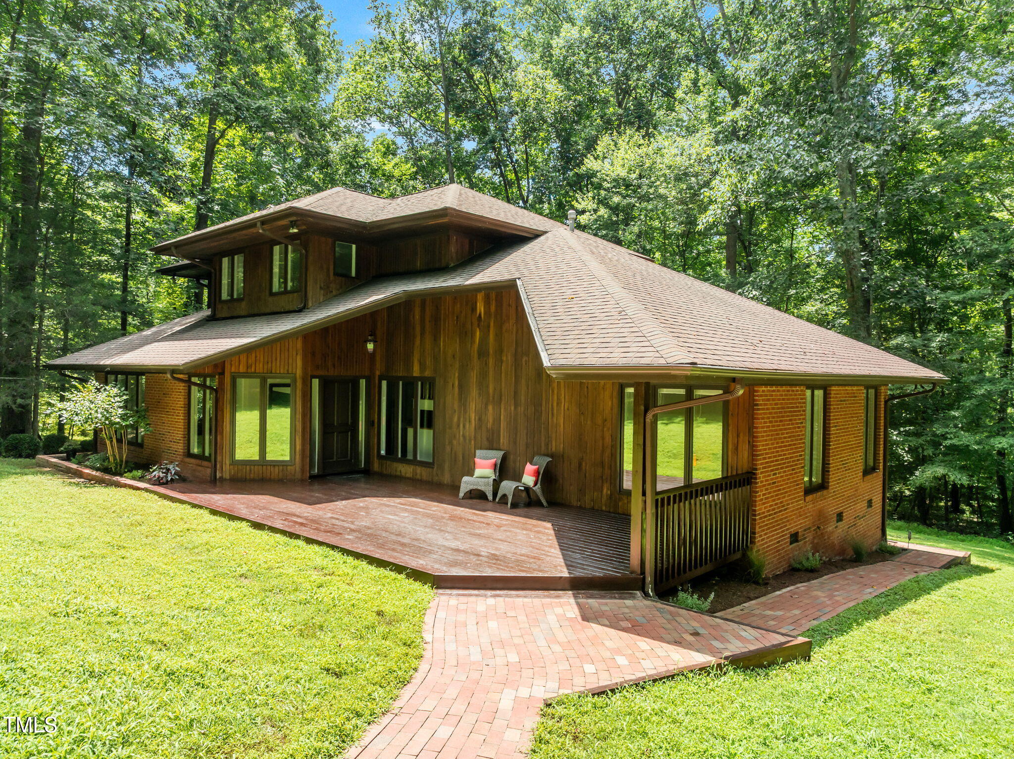 801 Creekstone Drive Chapel Hill, NC 27516 - Photo 56 of 65 a front view of a house with a yard