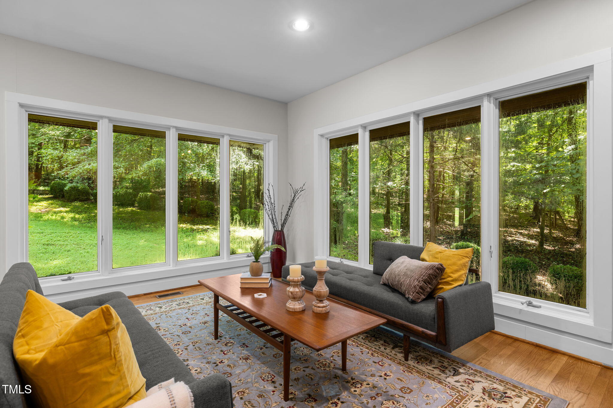 801 Creekstone Drive Chapel Hill, NC 27516 - Photo 5 of 65 a living room with furniture and a large window