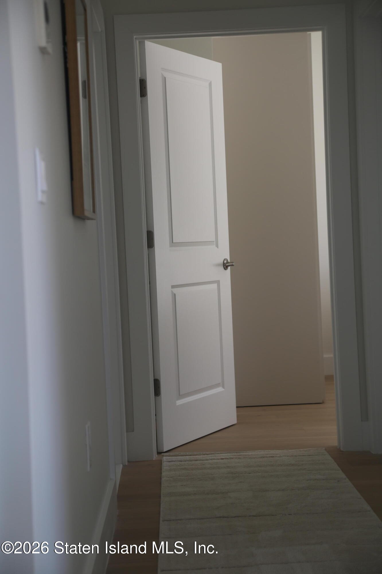 1221 Forest Hill Road, Unit 2 Staten Island, NY 10314 - Photo 5 of 10 a view of front door