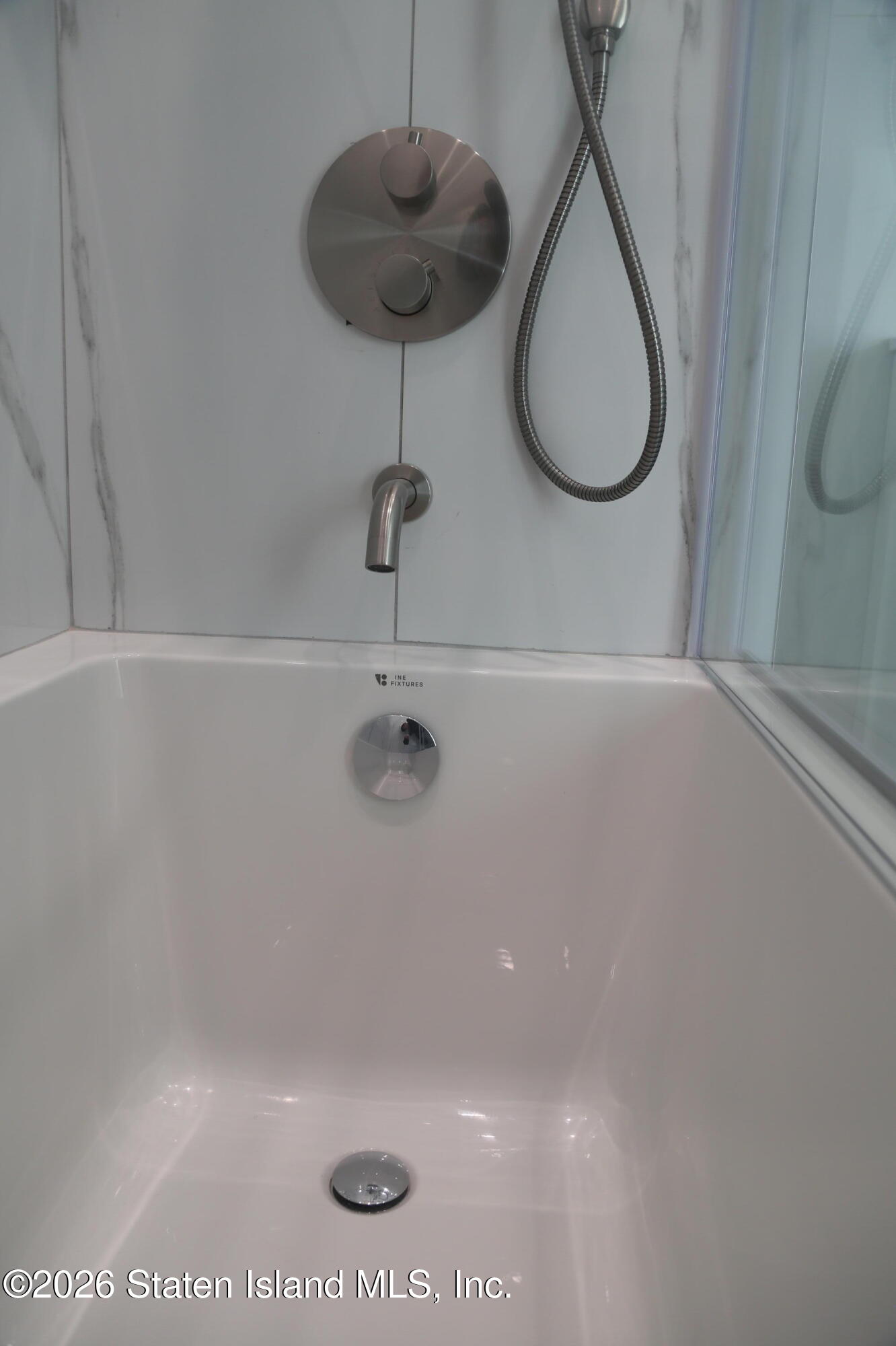 1221 Forest Hill Road, Unit 2 Staten Island, NY 10314 - Photo 10 of 10 a bathroom with a shower