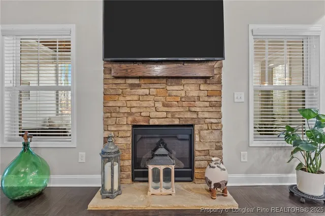 a spacious bedroom with a bed and a chandelier