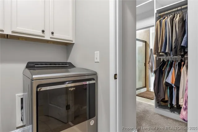 a spacious bathroom with a granite countertop sink mirror and