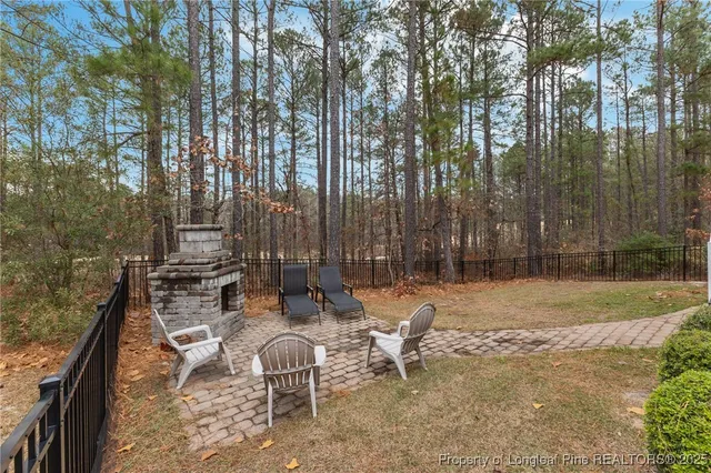 a backyard of a house with seating space