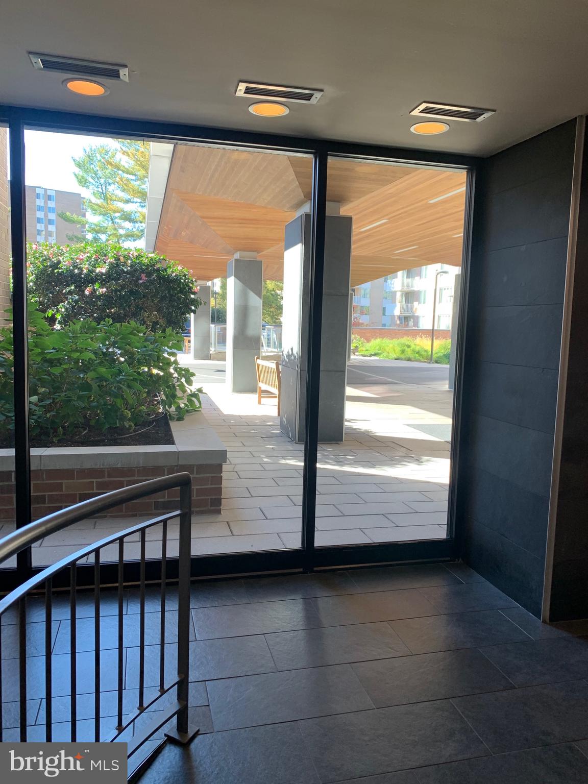 2939 Van Ness Street Northwest, Unit 216 Washington, DC 20008 - Photo 14 of 20 a view of a back yard from a big room