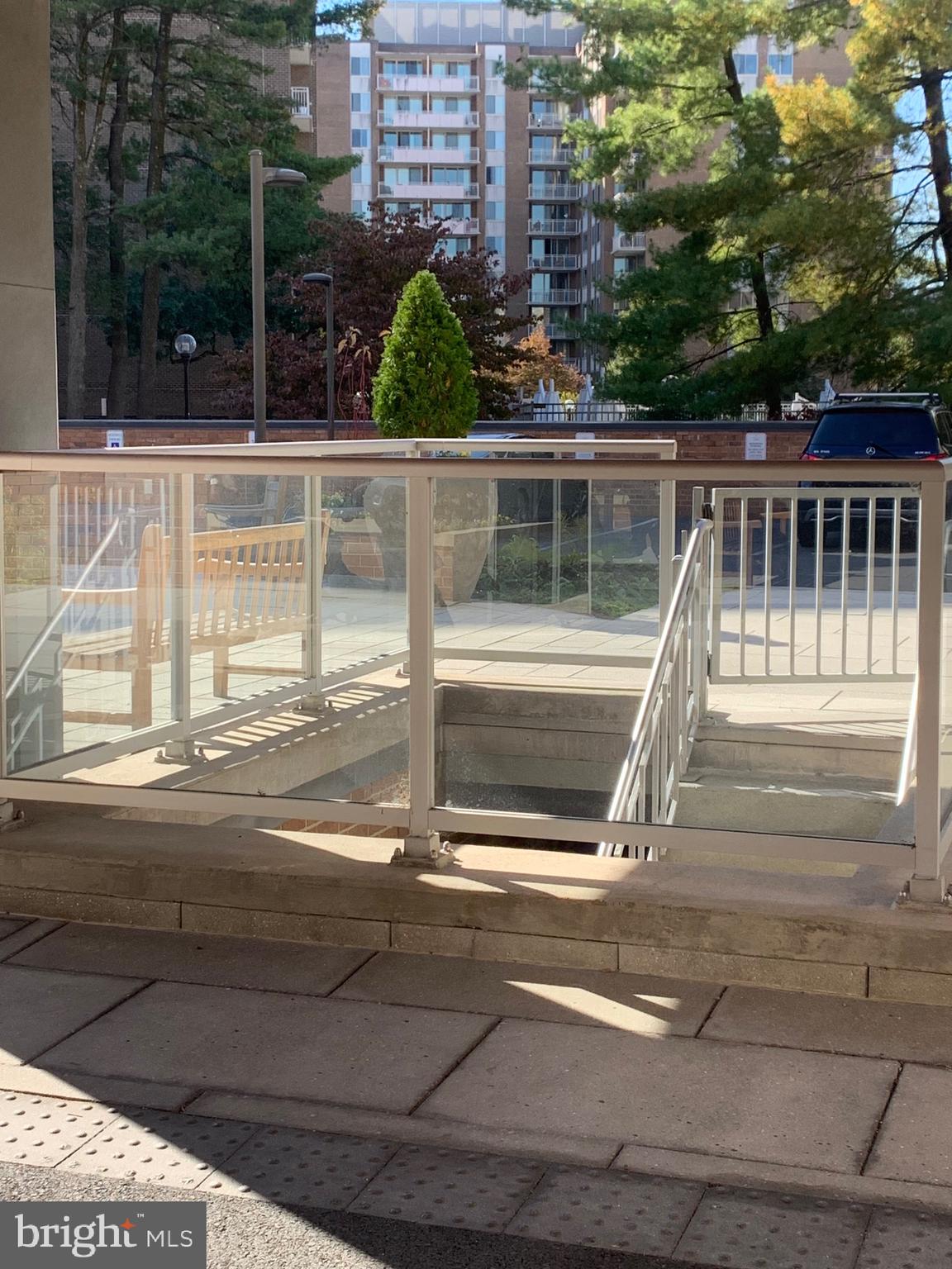 2939 Van Ness Street Northwest, Unit 216 Washington, DC 20008 - Photo 17 of 20 a view of backyard with a flat screen tv