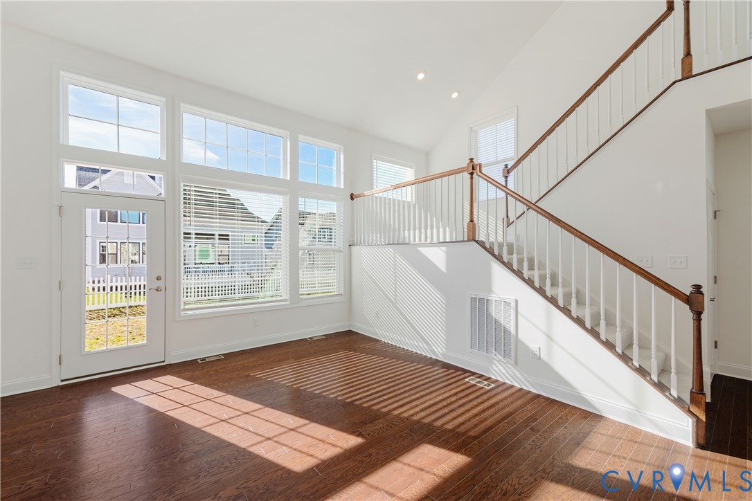10689 Fern Basket Road Glen Allen, VA 23059 - Photo 17 of 50 a view of an empty room with wooden floor and a window
