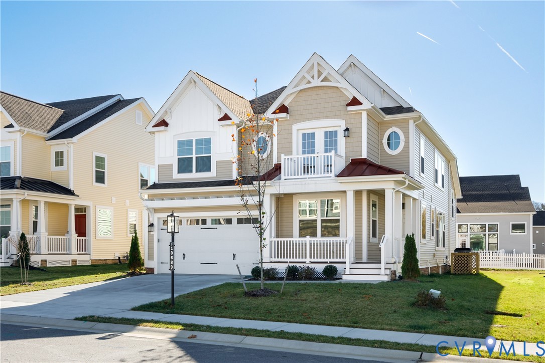 10689 Fern Basket Road Glen Allen, VA 23059 - Photo 2 of 50 a front view of a house with a yard