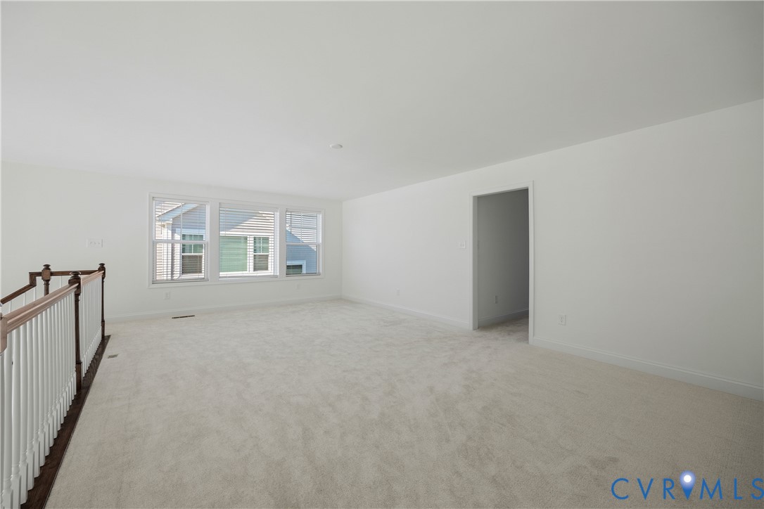 10689 Fern Basket Road Glen Allen, VA 23059 - Photo 26 of 50 a view of an empty room with a window