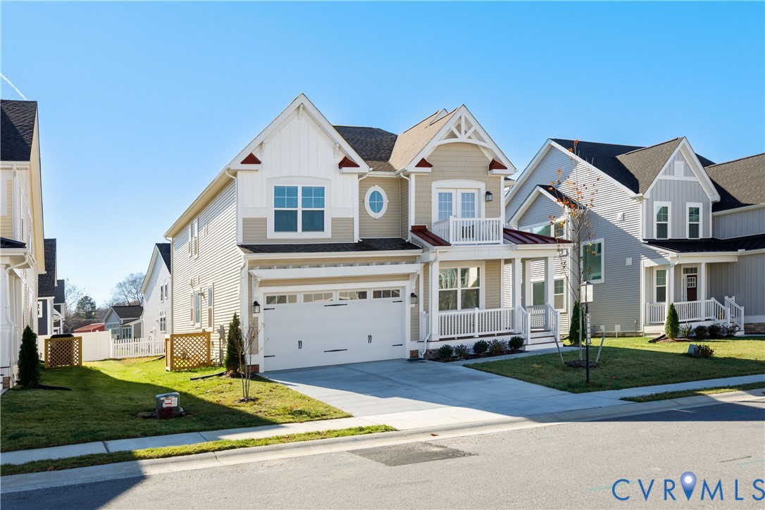 10689 Fern Basket Road Glen Allen, VA 23059 - Photo 3 of 50 a front view of a house with garden