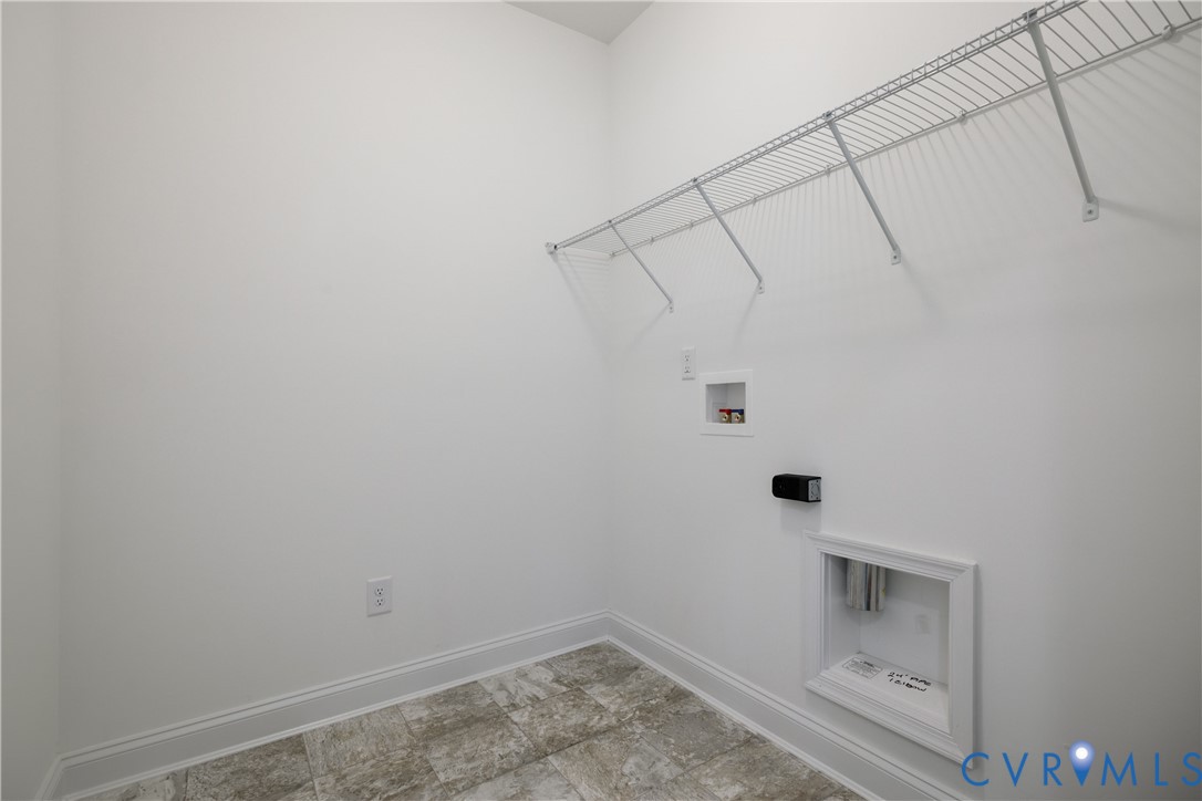 10689 Fern Basket Road Glen Allen, VA 23059 - Photo 40 of 50 a view of a room with racks on the wall