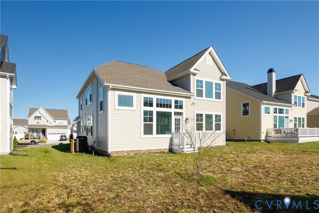 10689 Fern Basket Road Glen Allen, VA 23059 - Photo 41 of 50 a front view of a house with a yard