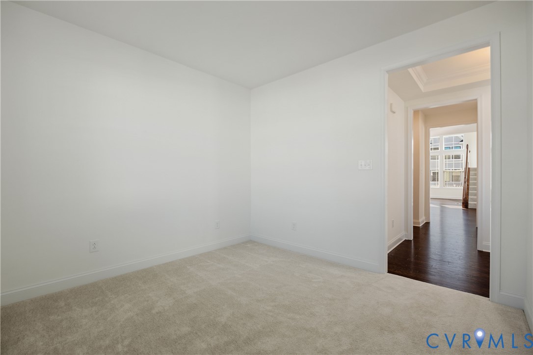 10689 Fern Basket Road Glen Allen, VA 23059 - Photo 7 of 50 an empty room with windows