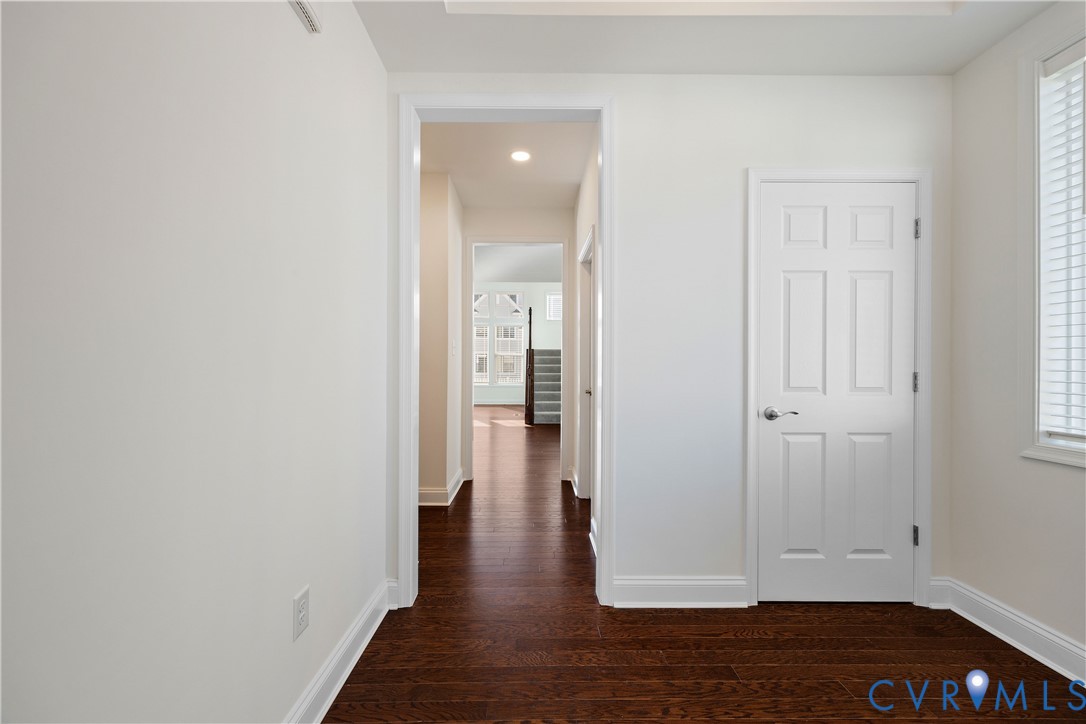 10689 Fern Basket Road Glen Allen, VA 23059 - Photo 8 of 50 a view of an empty room with wooden floor and closet