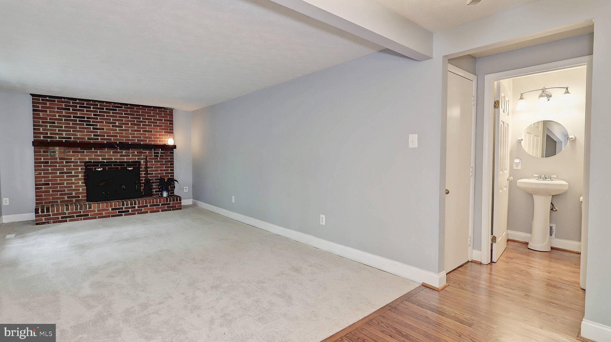 8500 Falling Leaf Road Springfield, VA 22153 - Photo 10 of 23 Family room and view of half bathroom.
