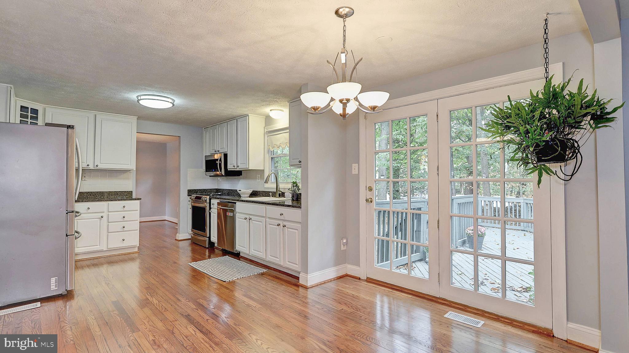 8500 Falling Leaf Road Springfield, VA 22153 - Photo 8 of 23 Gorgeous double doors leading to the deck.