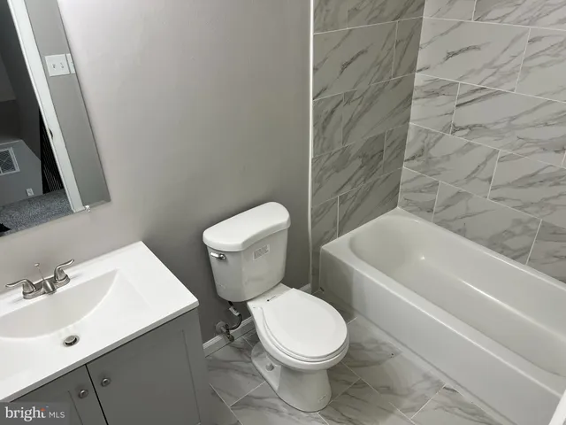 a bathroom with a bathtub