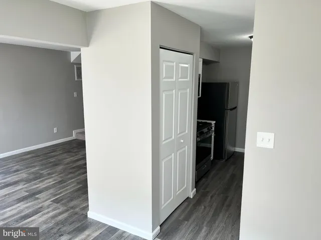 a kitchen with a sink and a microwave