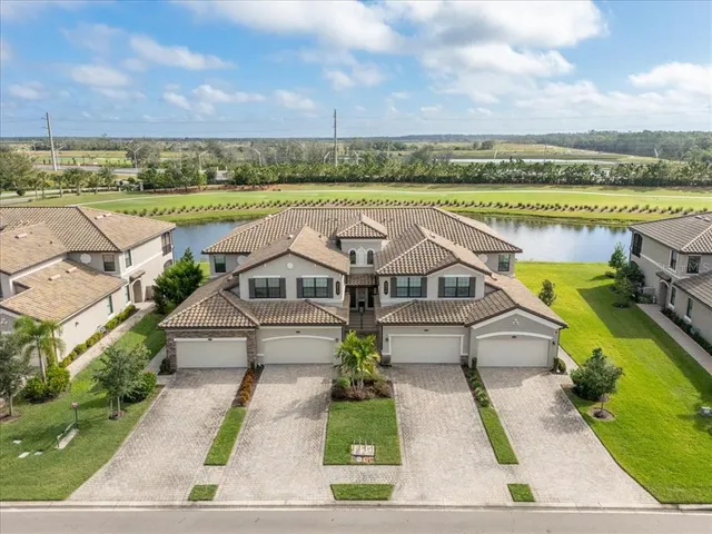 an aerial view of a house with a garden