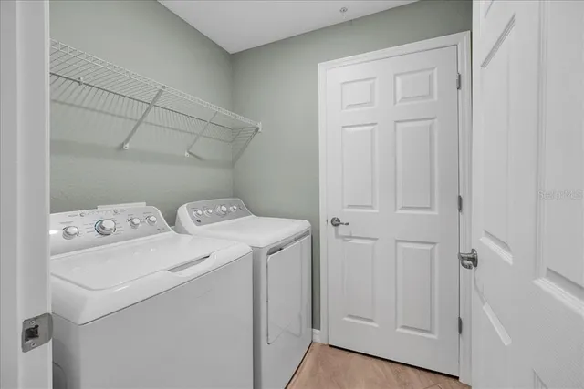 an aerial view of a house with outdoor space