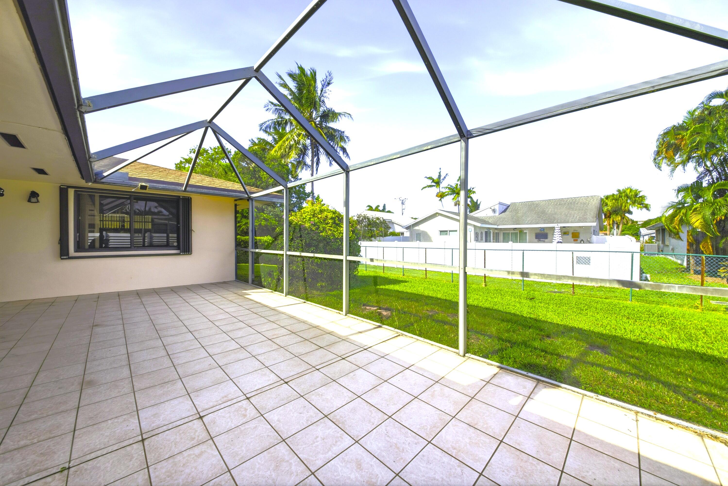 309 Southeast 4th Street Dania Beach, FL 33004 - Photo 18 of 23 a view of outdoor space and yard