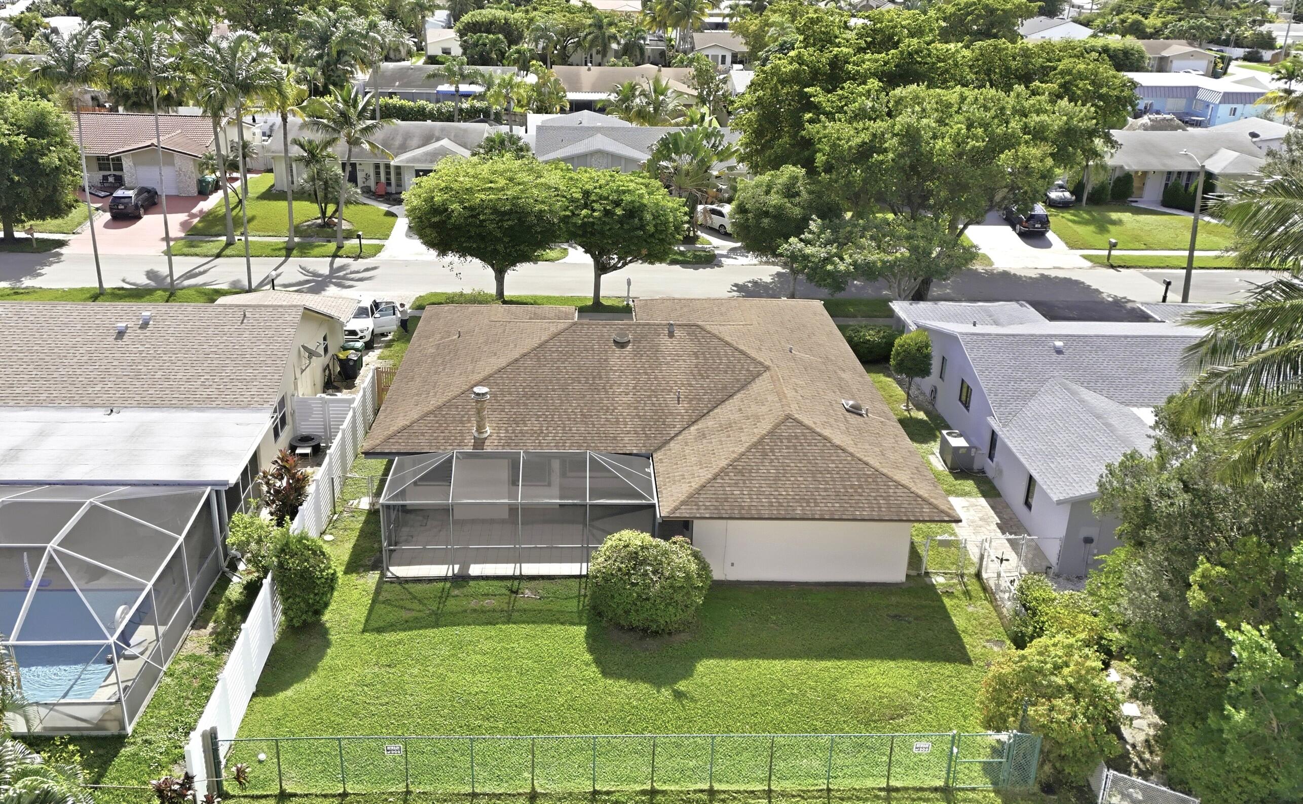 309 Southeast 4th Street Dania Beach, FL 33004 - Photo 20 of 23 an aerial view of a house with garden space and street view