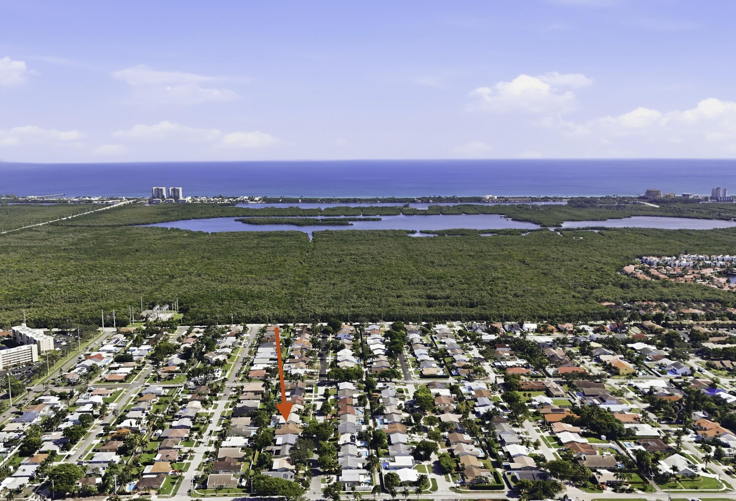 309 Southeast 4th Street Dania Beach, FL 33004 - Photo 21 of 23 a view of a lush green field