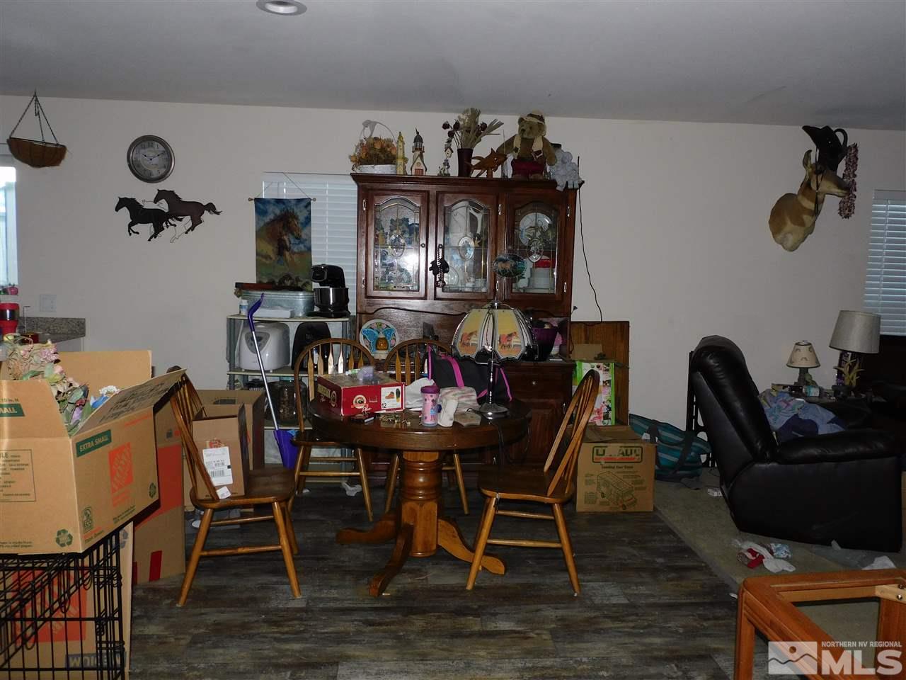 17875 Fantail Circle Reno, NV 89508 - Photo 6 of 15 a view of a dining room with furniture and wooden floor