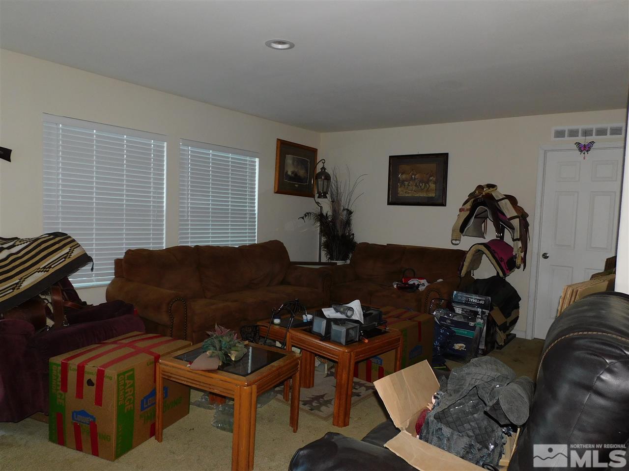 17875 Fantail Circle Reno, NV 89508 - Photo 7 of 15 a living room with furniture and a window