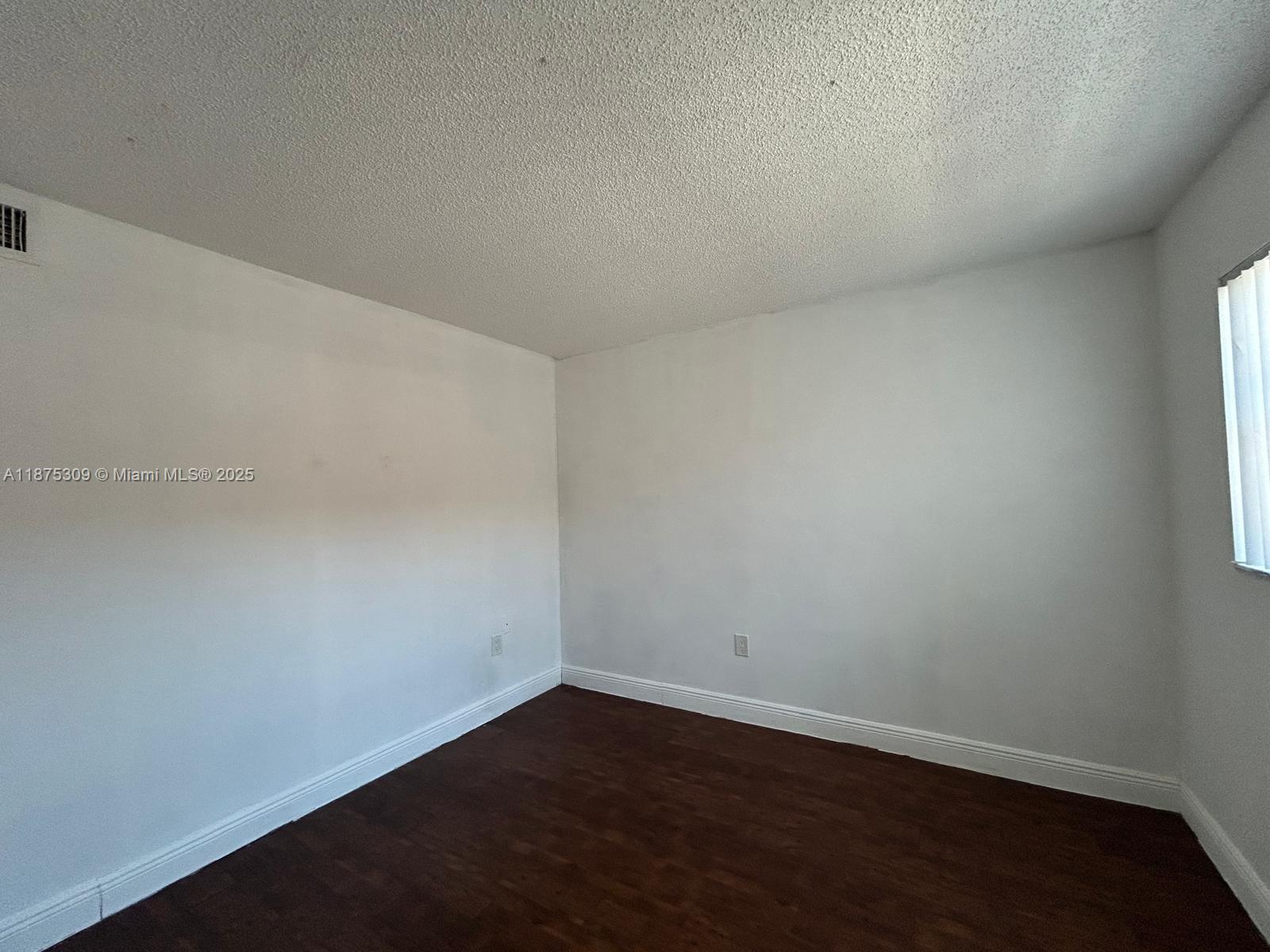 19741 Southwest 114th Avenue, Unit 361 Miami, FL 33157 - Photo 5 of 20 a view of an empty room