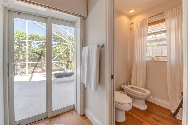 5125 Southeast Matousek Street Stuart, FL 34997 - Photo 13 of 39 a bathroom with a toilet and a shower