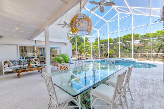 5125 Southeast Matousek Street Stuart, FL 34997 - Photo 25 of 39 a dining room with furniture and a large window
