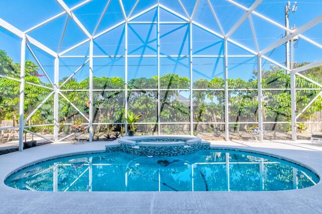 5125 Southeast Matousek Street Stuart, FL 34997 - Photo 26 of 39 a view of a living room and window
