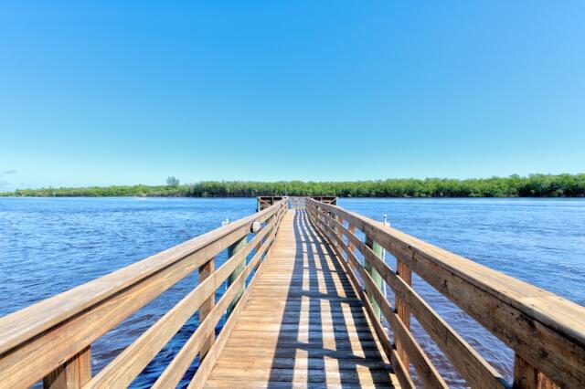5125 Southeast Matousek Street Stuart, FL 34997 - Photo 37 of 39 a view of wooden floor with a lake view