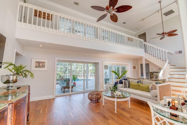 5125 Southeast Matousek Street Stuart, FL 34997 - Photo 4 of 39 a living room with furniture and a table