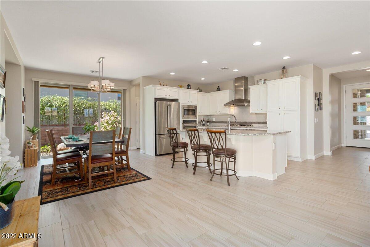 3425 Rising Sun Ridge Wickenburg, AZ 85390 - Photo 15 of 38 Dining Room w/Sliding Glass Door