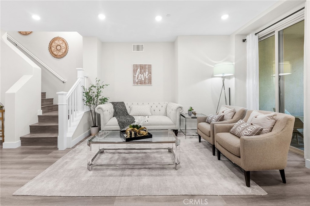 67 Plateau Irvine, CA 92618 - Photo 1 of 32 a living room with furniture