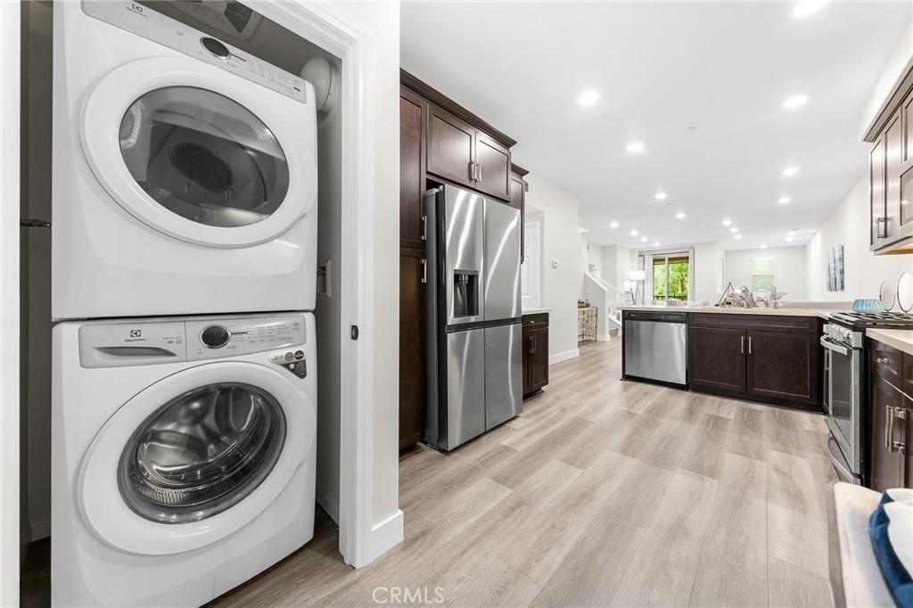 67 Plateau Irvine, CA 92618 - Photo 17 of 32 a view of a kitchen with a washer and dryer