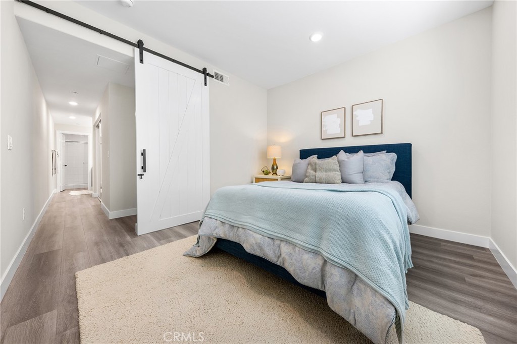 67 Plateau Irvine, CA 92618 - Photo 20 of 32 a bedroom with a bed and a window