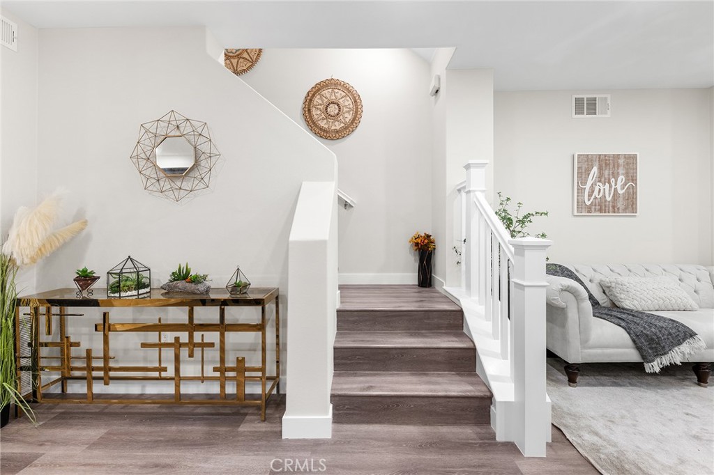 67 Plateau Irvine, CA 92618 - Photo 22 of 32 a view of a livingroom with furniture and a fan