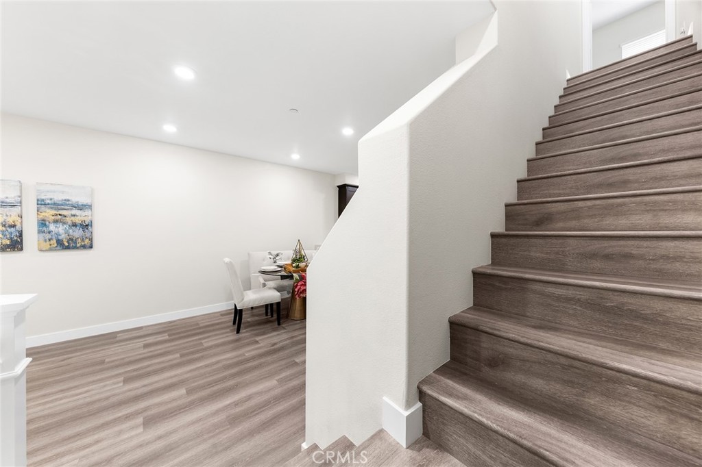 67 Plateau Irvine, CA 92618 - Photo 23 of 32 a view of entryway and hall with wooden floor