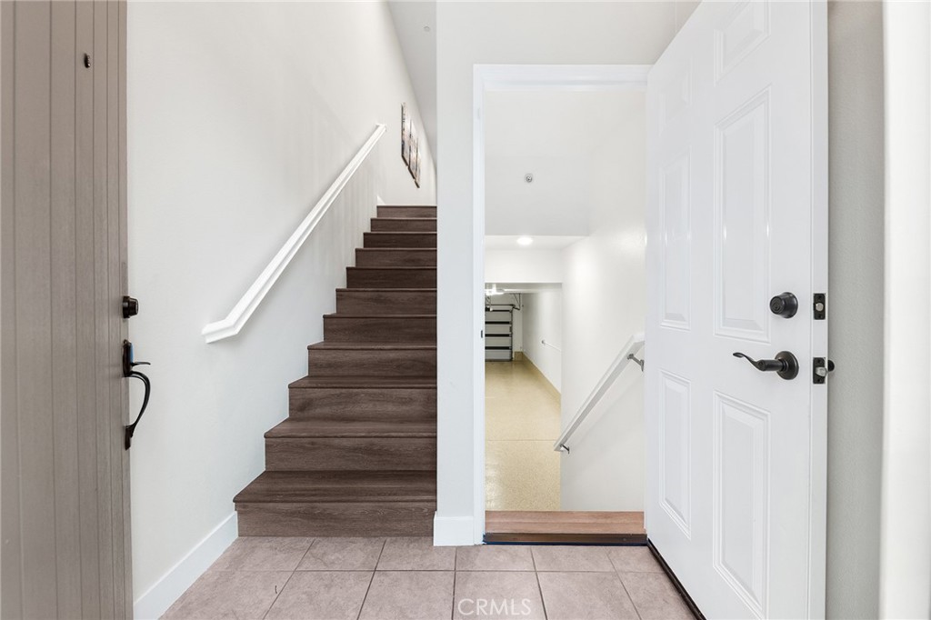 67 Plateau Irvine, CA 92618 - Photo 3 of 32 a view of entryway and hall with wooden floor