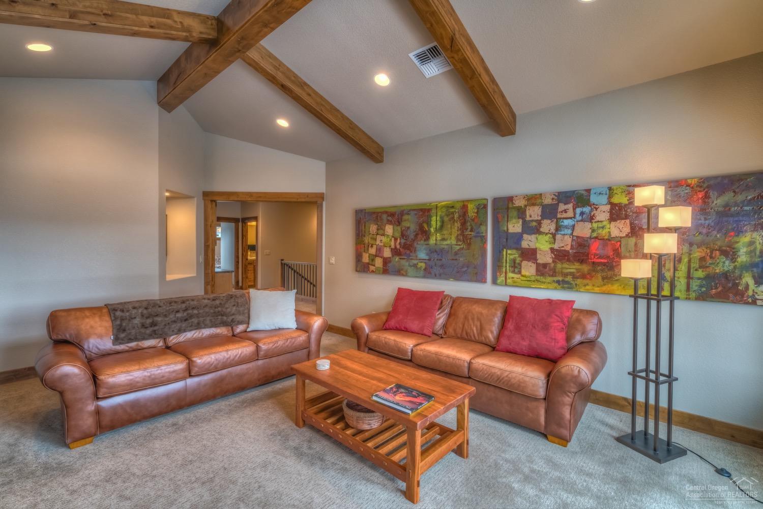 60436 Snap Shot Loop Bend, OR 97702 - Photo 18 of 25 Large family room upstairs.