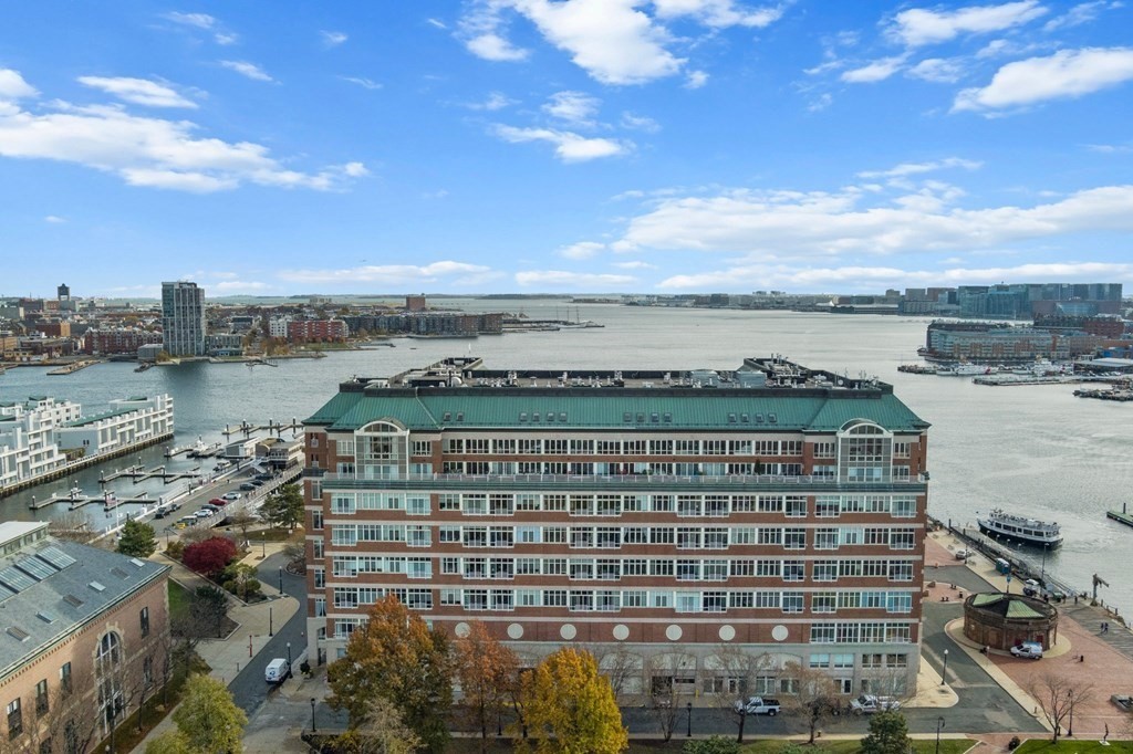 a view of a city with a lake