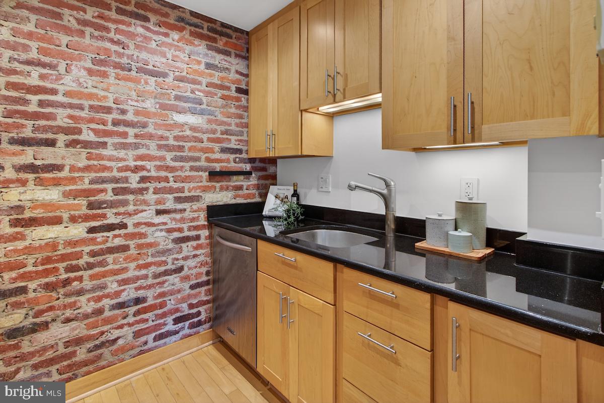 1810 California Street Northwest, Unit 202 Washington, DC 20009 - Photo 11 of 52 Charming kitchen with rustic flair.
