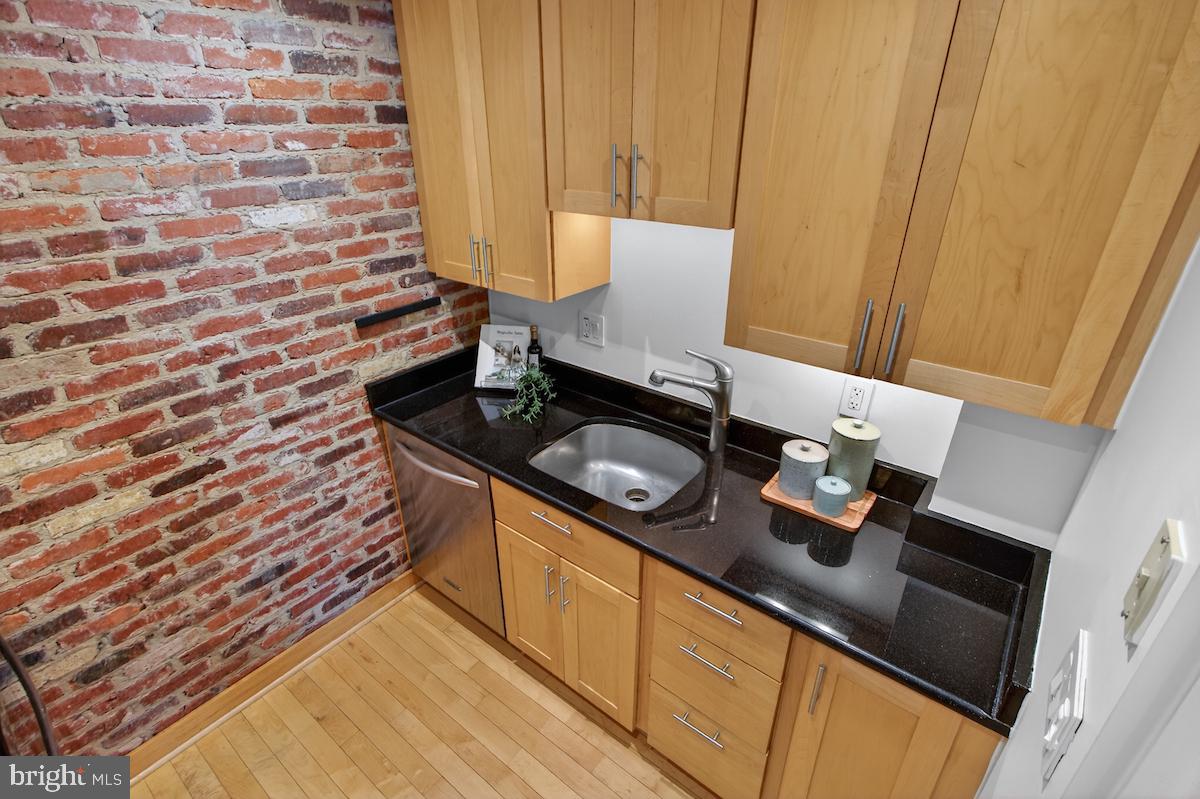 1810 California Street Northwest, Unit 202 Washington, DC 20009 - Photo 16 of 52 Charming kitchen with rustic flair.